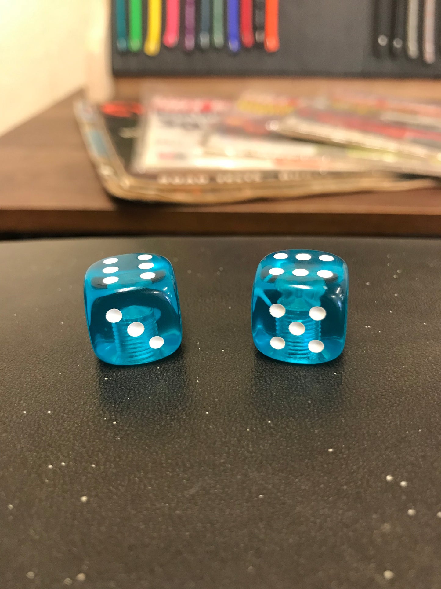 Translucent Teal Dice Valve Stem Caps